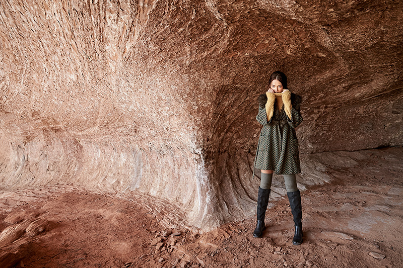 woman in chilly cave