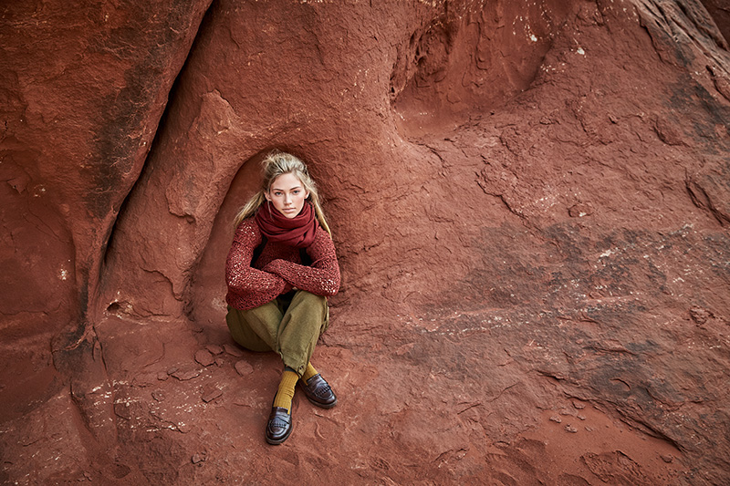 woman sitting crosslegged Canyonlands